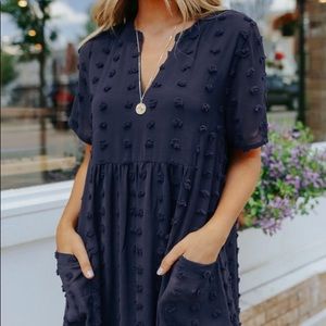 Size L (10-12) Pocketed knee length dress